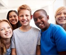 A smiling group of middle school students